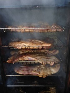 Lamb belly being smoked for lamb bacon sandwich