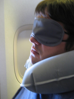 Sleeping-on-plane-small__223868876