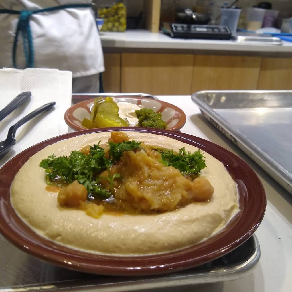 a plate of hummus