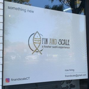the sign for Fin and Scale