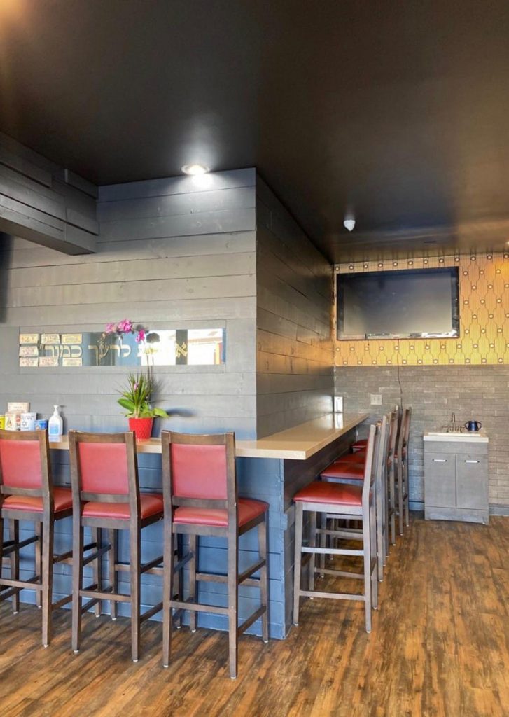 bar style seating with grey walls