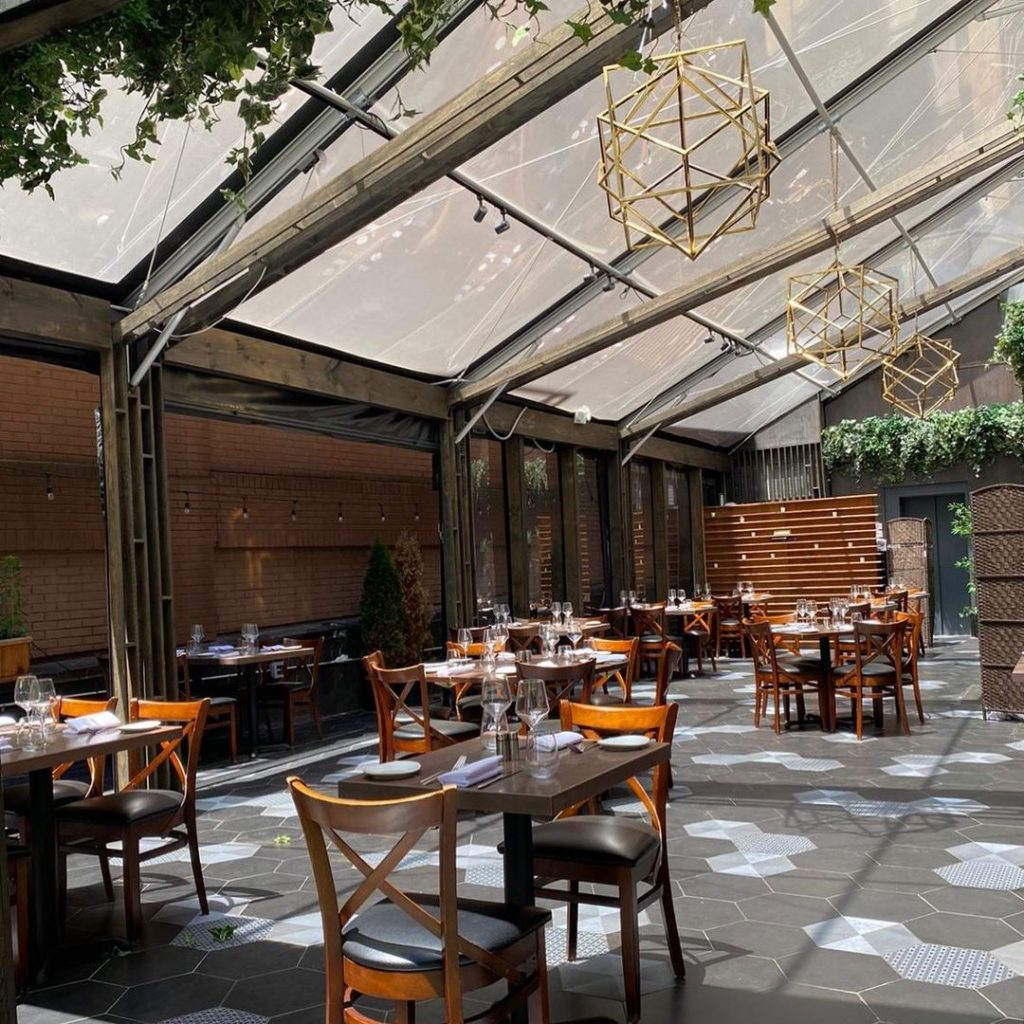 outdoor dining in an enclosed space