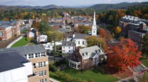 Aerial view of the Dartmouth College campus in Hanover, New Hampshire, with fall foliage and the white church spire
