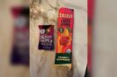 Skinny Dipped dark chocolate peanut butter cup and Solely organic mango raspberry fruit jerky
