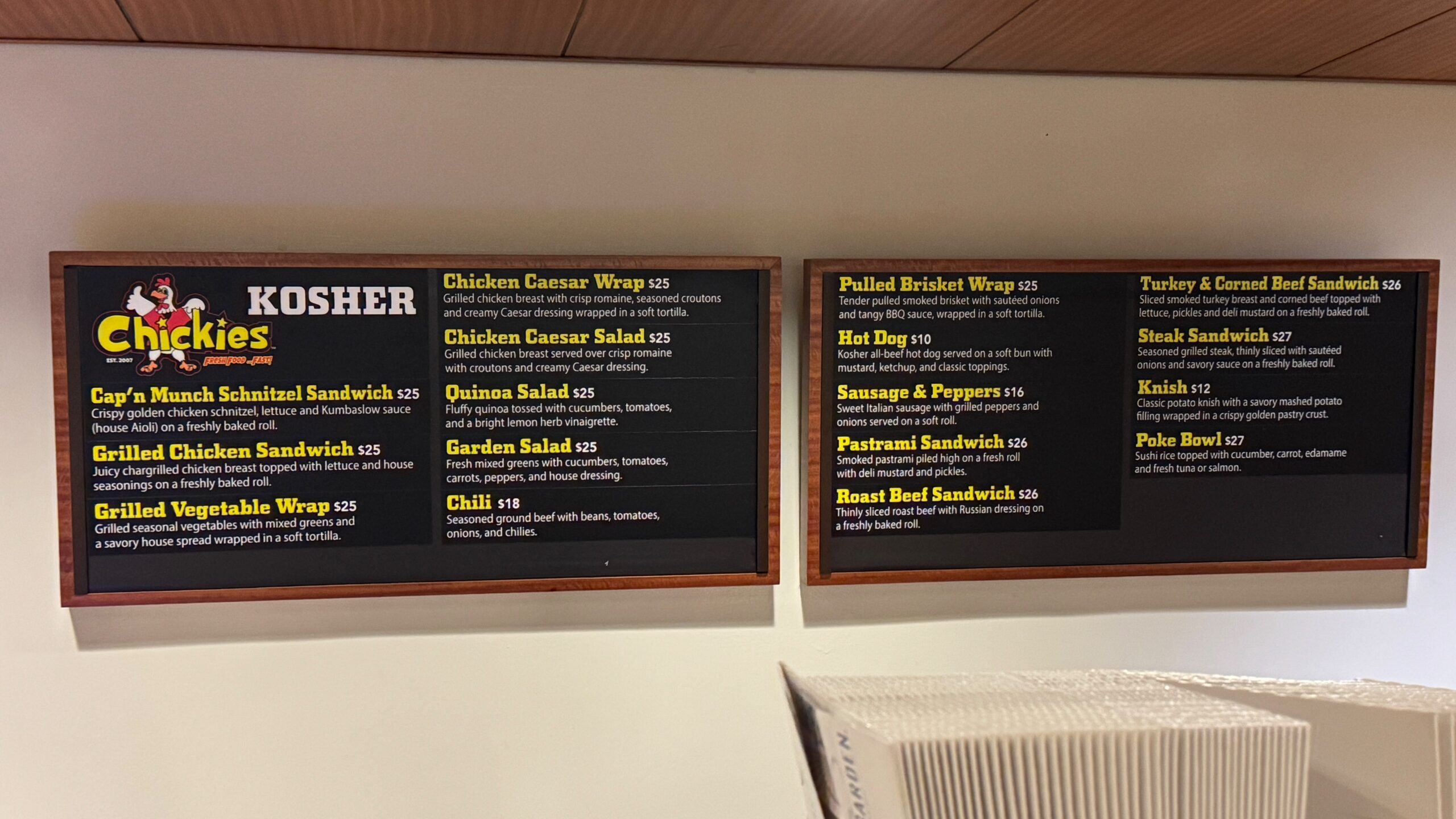 Chickies kosher menu board with prices at Madison Square Garden