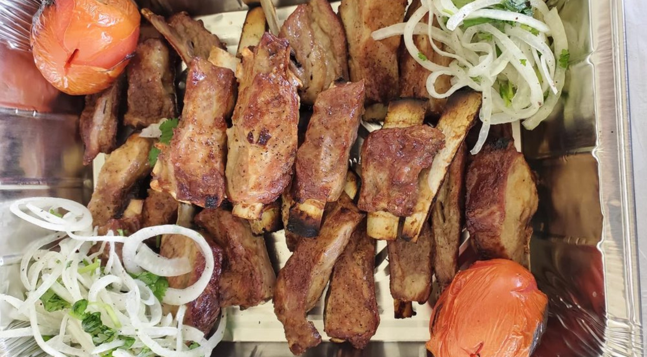 Grilled meat skewers at Chayhana Samarkand