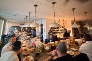 Guests dining at the chef's counter at Mutra in North Miami