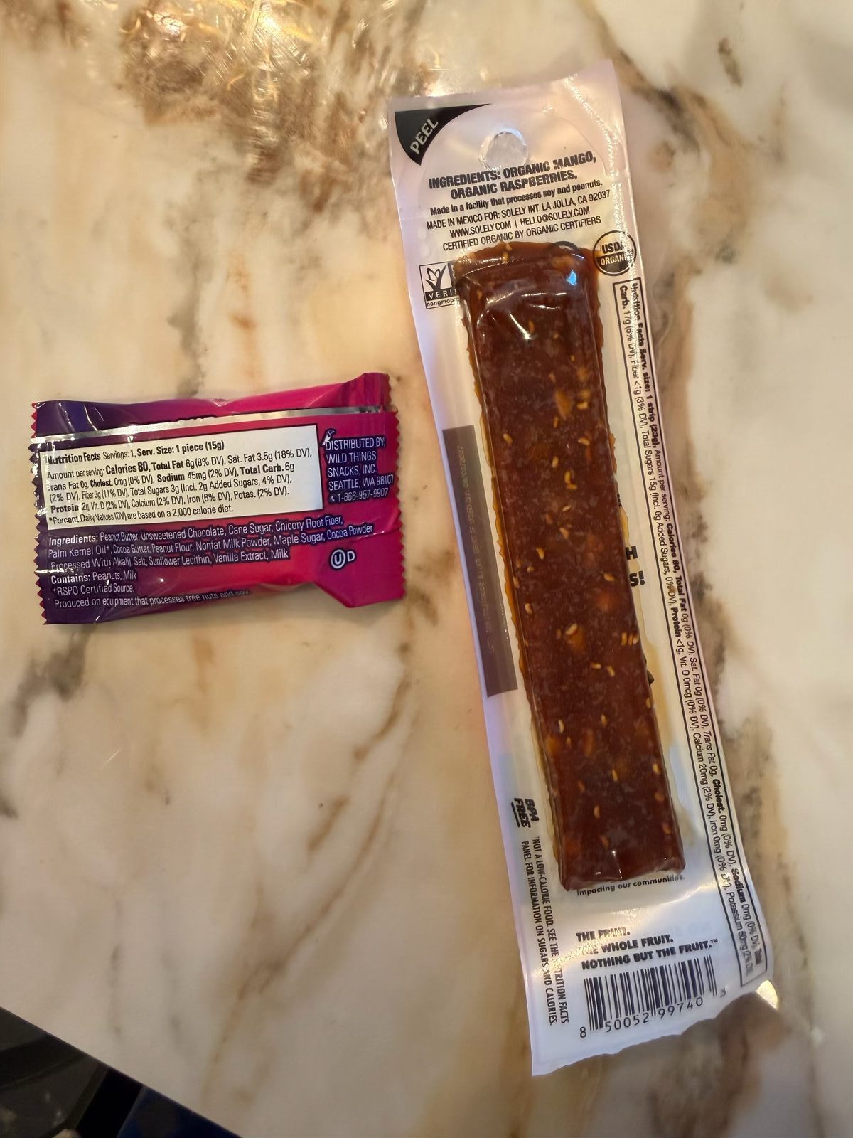 Ingredient and nutrition panels showing the OU kosher symbol on two snack packages